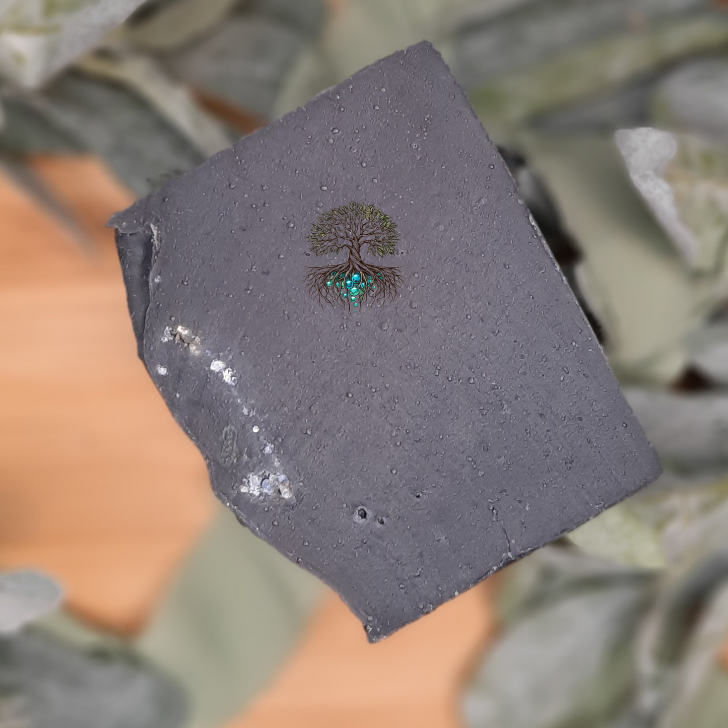 Einar hemp soap bar, black soap bar with silver biodegradable glitter and sea salt on top to appear as stars.