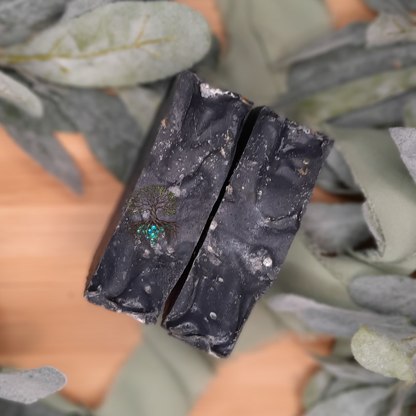 Einar hemp soap bar, black soap bar with silver biodegradable glitter and sea salt on top to appear as stars. 