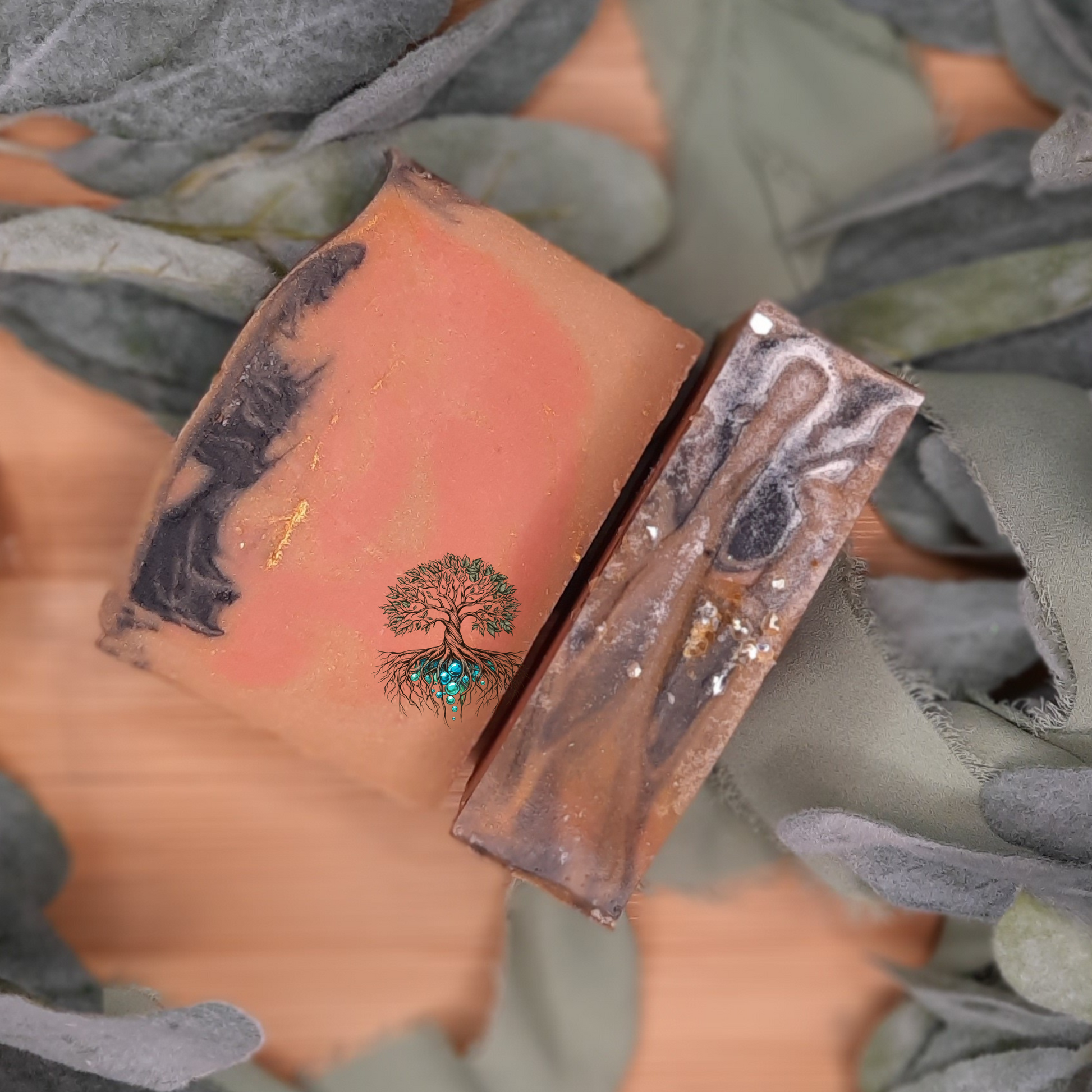 Avalon Hotel hemp soap bar, orange gold and black swirl soap bar with white mica and golden biodegradable glitter top. 