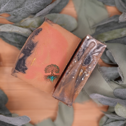 Avalon Hotel hemp soap bar, orange gold and black swirl soap bar with white mica and golden biodegradable glitter top. 