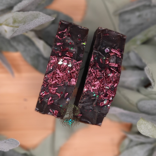 hemp soap bar, dragon queen soap bar, dark brown bar soap with red botanicals and biodegradable glitter on top. 